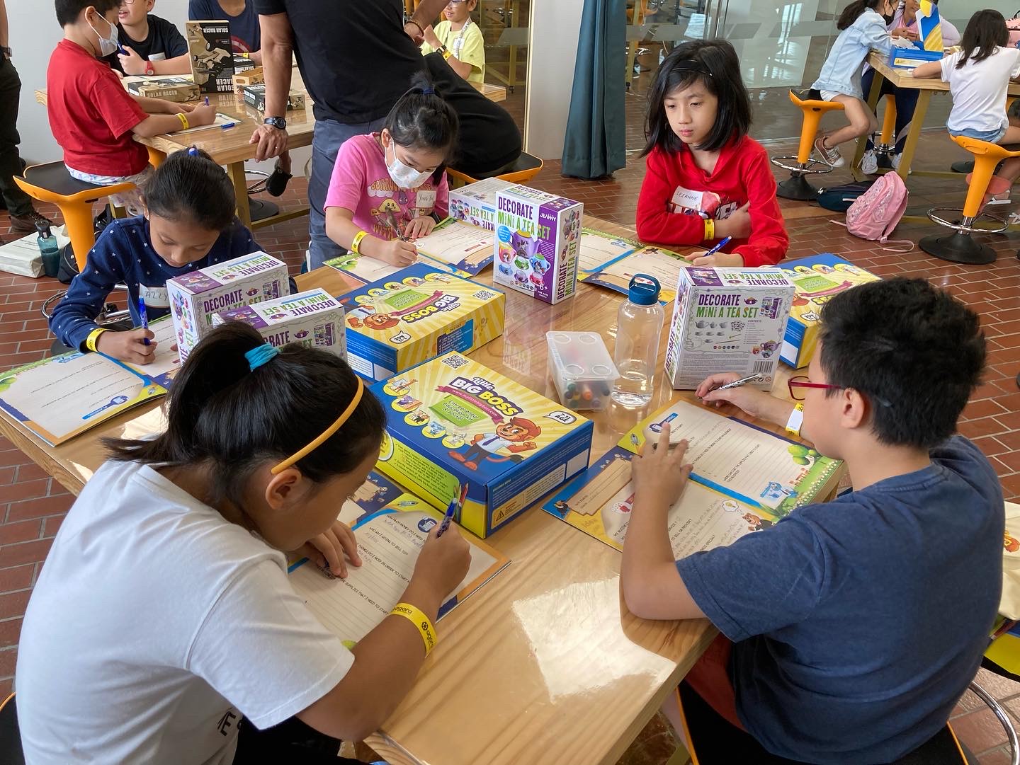 Children engaged in hands-on workshop activities